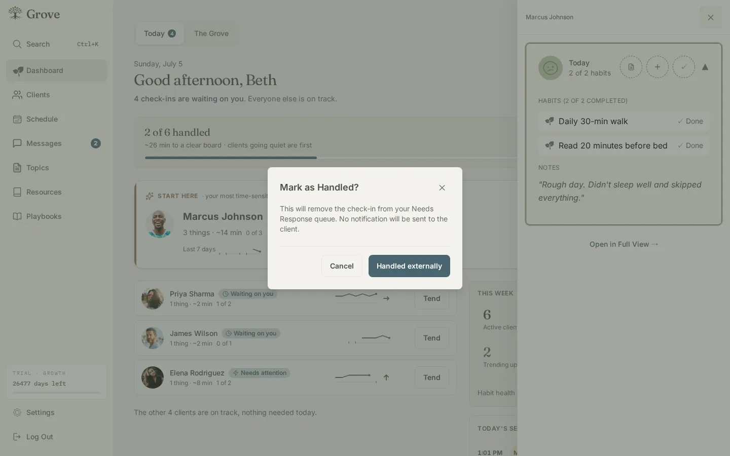 The Mark as Handled? confirmation dialog, which clears a check-in from the queue without notifying the client