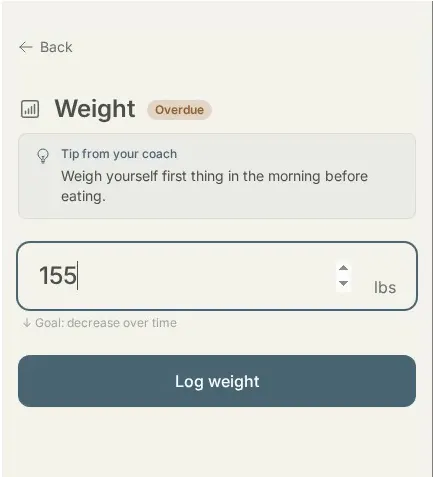 Client logging a weight measurement with the coach tip visible